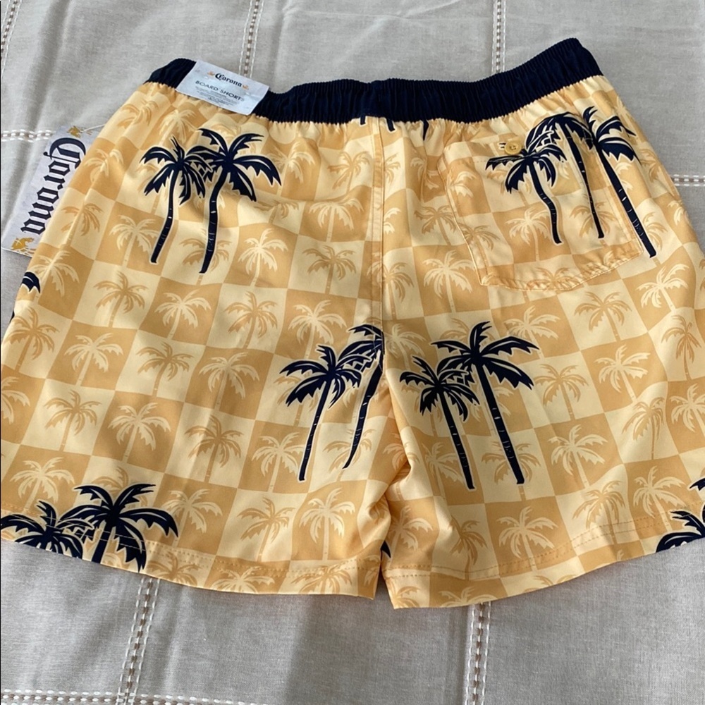 Man Corona Athletic Yellow and Black Shorts with Tropical Design for swim. - Picture 6 of 15